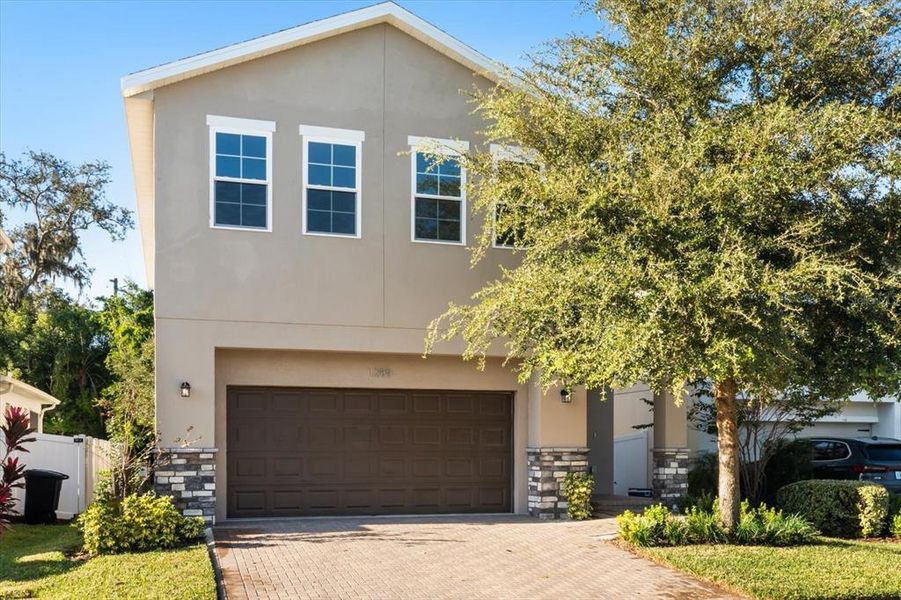 Front exterior of a new home in , Casselberry, FL, highlighting curb appeal (Image 2).