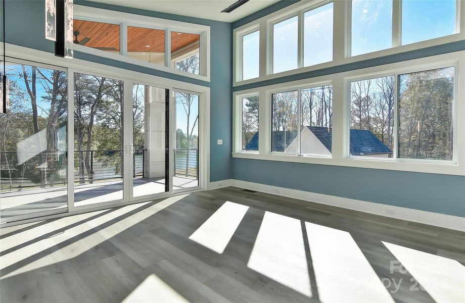 Primary bedroom with balcony