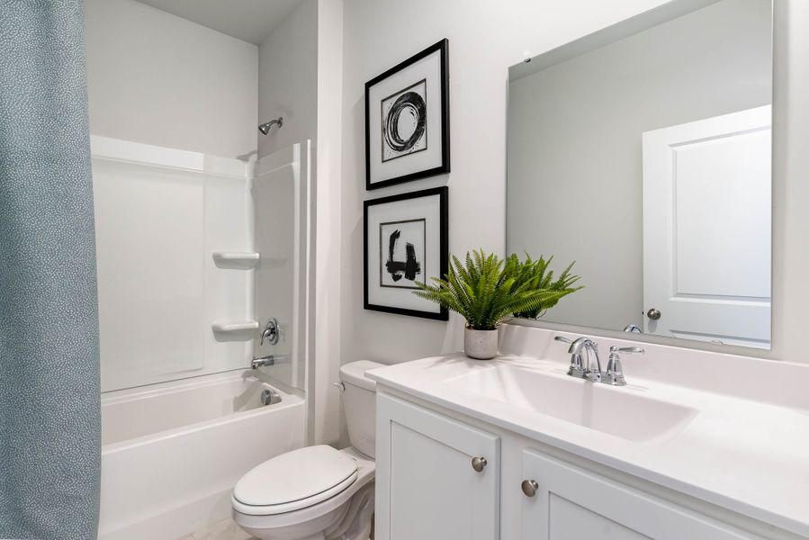 Representative furnished interior of a home built from the CALI by D.R. Horton in Kingston Bay, Conway (Image 7).