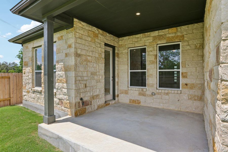 Exterior details and patio area of a home in Persimmon, Buda (Image 3). Exterior details and patio area of a home in Persimmon, Buda (Image 3).