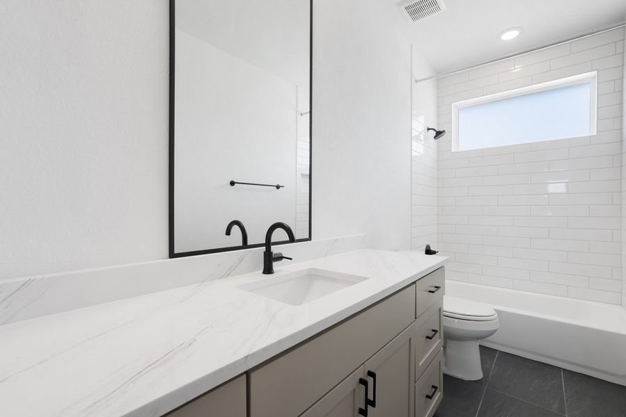 Furnished interior view inside a new home in Foxfield, Austin (Image 8). Furnished interior view inside a new home in Foxfield, Austin (Image 8).