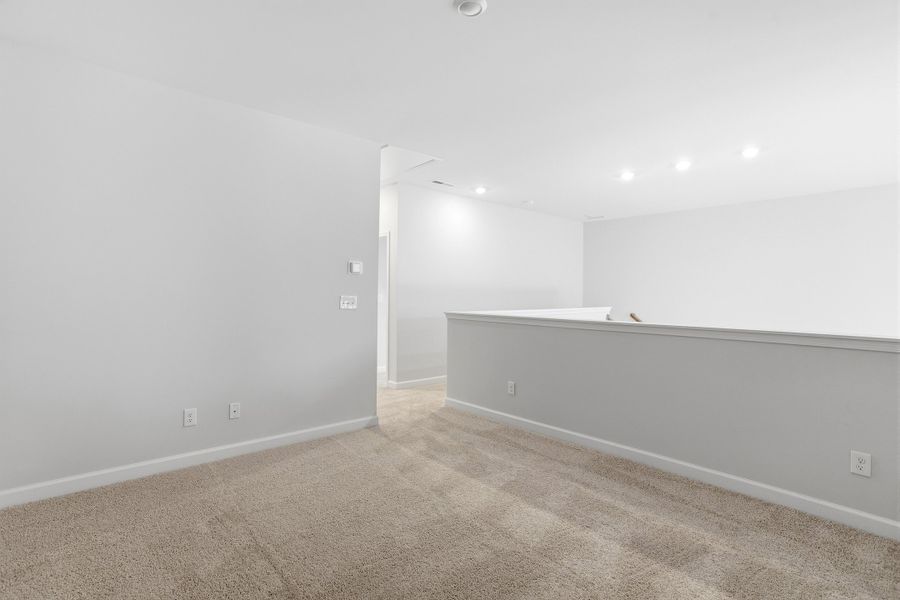 Spacious, unfurnished interior of a new home in Ovation at Sweetbrier, Durham (Image 25).