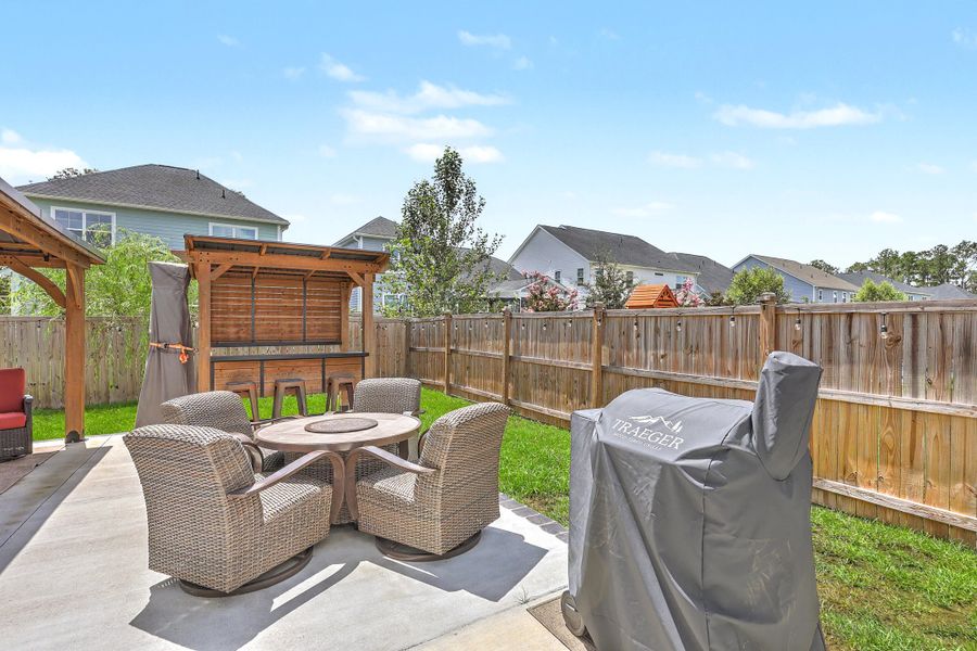 Exterior details and patio area of a home in , Johns Island (Image 3).