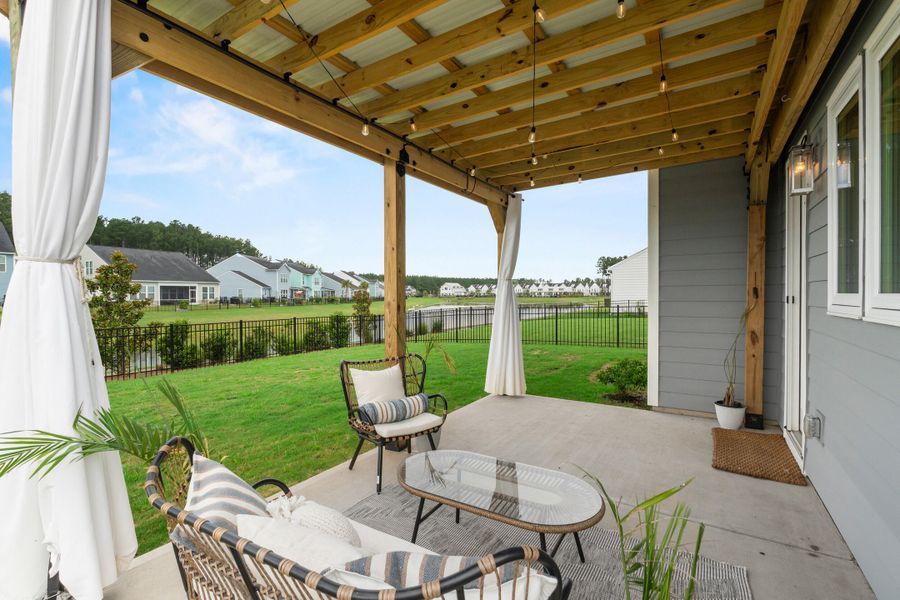 Exterior details and patio area of a home in , Ravenel (Image 3).