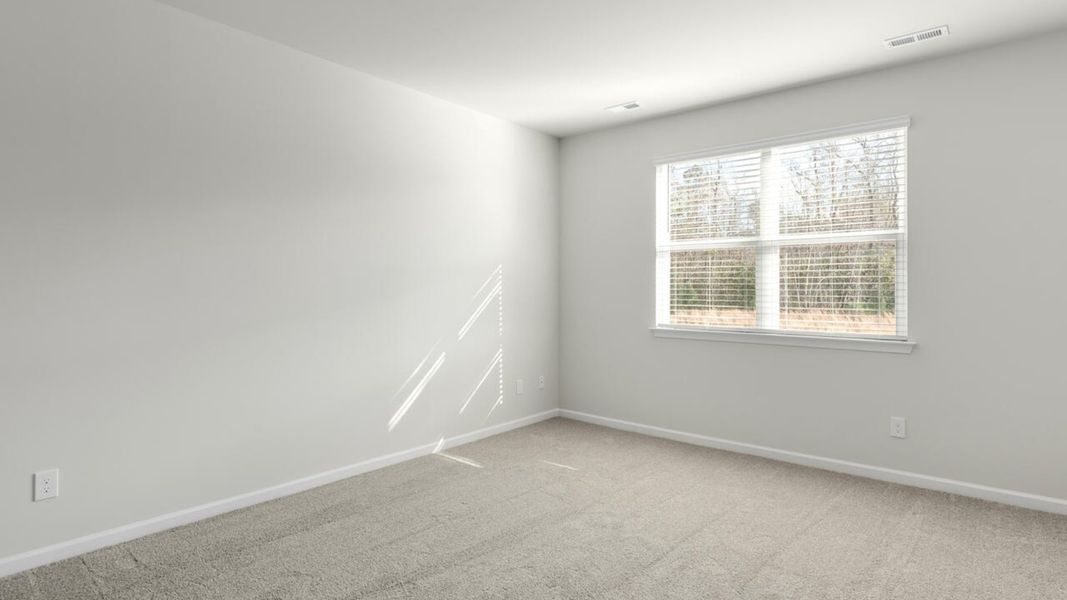 Spacious, unfurnished interior of a new home in Indigo Preserve, Leland (Image 20).