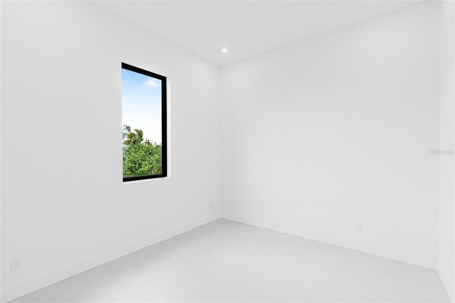 Spacious, unfurnished interior of a new home in , Port Charlotte (Image 26).