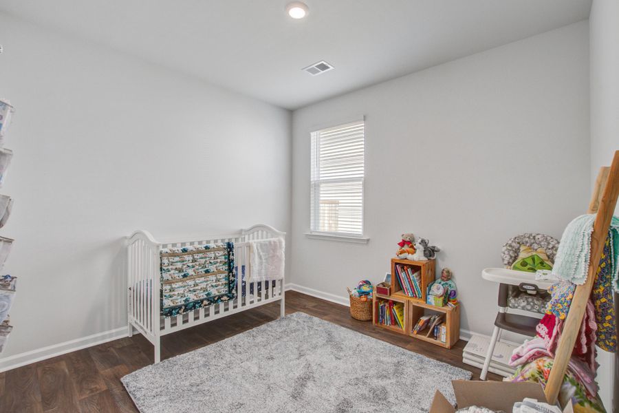 Furnished interior view inside a new home in Pine Hills at Cane Bay, Summerville (Image 40).