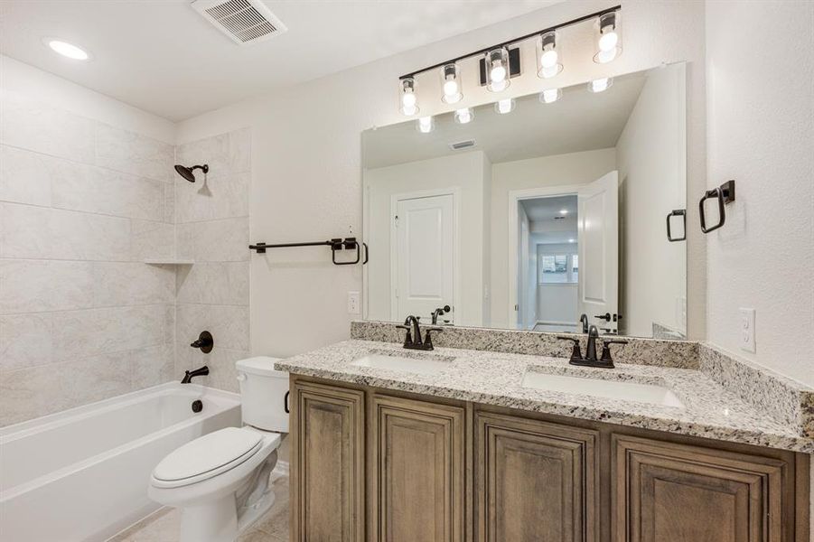 Furnished interior view inside a new home in Coyote Crossing, Godley (Image 13).