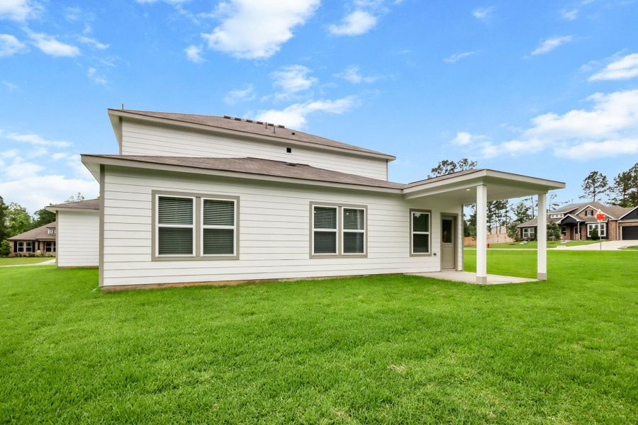 Exterior details and patio area of a home in Oakwood Ranch, Willis (Image 4).