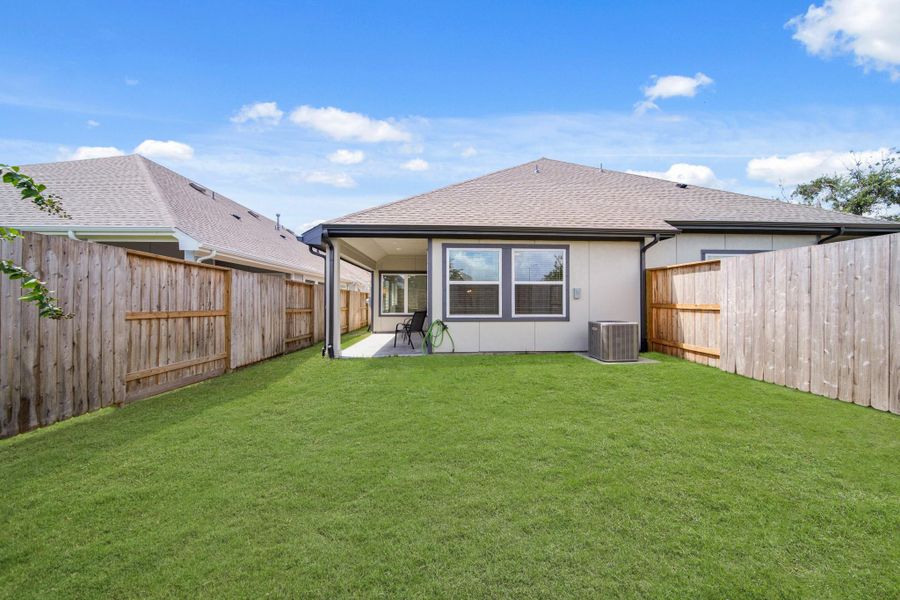 Exterior details and patio area of a home in , Iowa Colony (Image 20). Exterior details and patio area of a home in , Iowa Colony (Image 20).