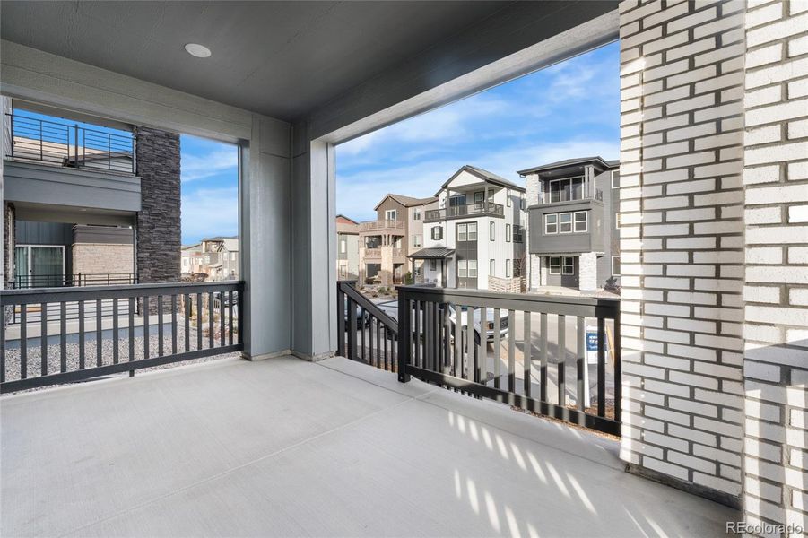 Exterior details and patio area of a home in Sterling Ranch Apex Collection, Littleton (Image 20).
