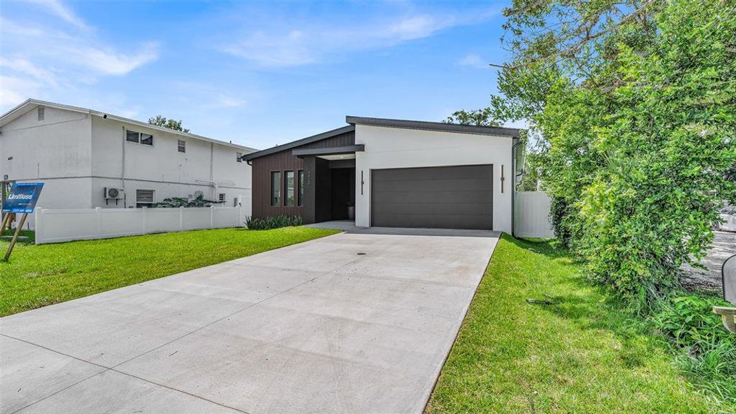 Front exterior of a new home in , St. Petersburg, FL, highlighting curb appeal (Image 26).