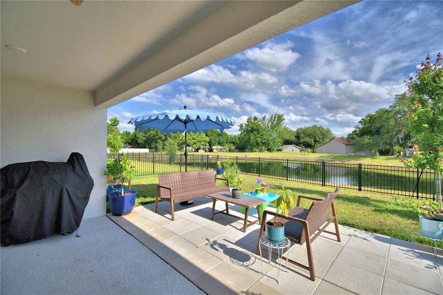 Exterior details and patio area of a home in Harmony at Lake Eloise, Winter Haven (Image 32).
