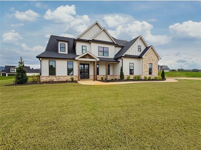 Front exterior of a new home in , Rydal, GA, highlighting curb appeal (Image 2). Front exterior of a new home in , Rydal, GA, highlighting curb appeal (Image 2).