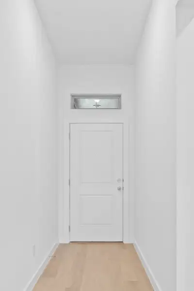 Entry in the Quartz home plan by Trophy Signature Homes – REPRESENTATIVE PHOTO Entry in the Quartz home plan by Trophy Signature Homes – REPRESENTATIVE PHOTO