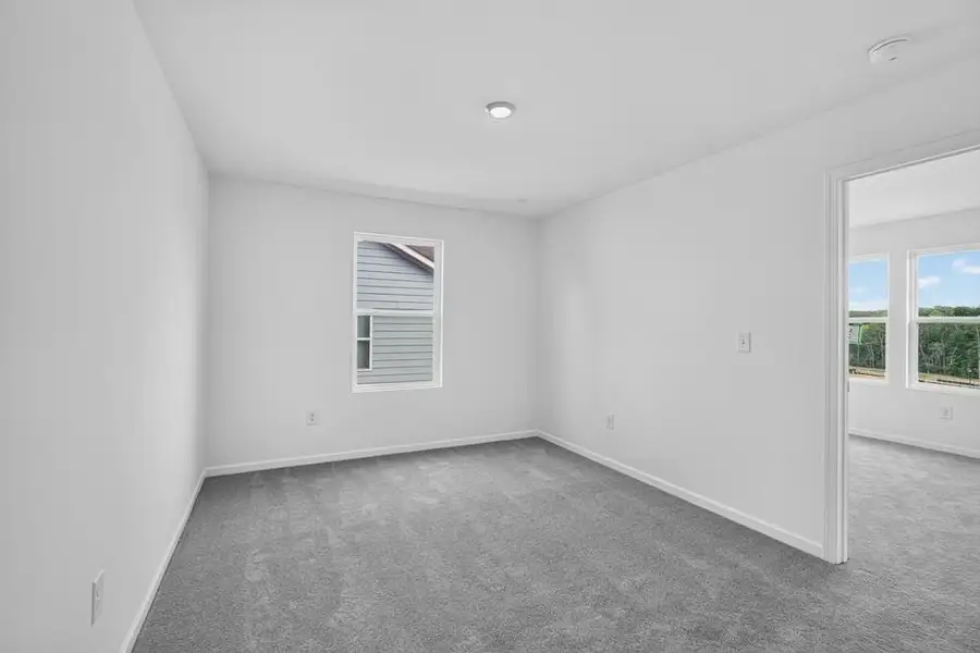Spacious, unfurnished interior of a new home in Weatherfield, Buford (Image 39).