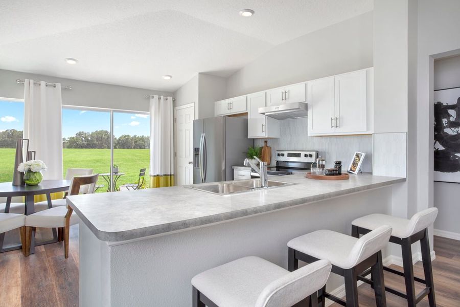 Representative furnished interior of a home built from the Plan 1346 Modeled by KB Home in River Run I, Zephyrhills (Image 10).