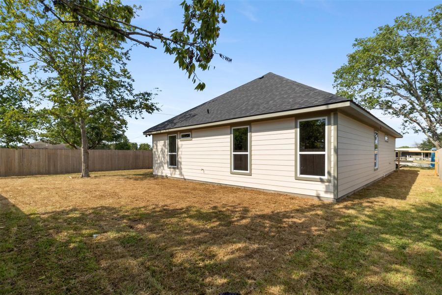 Exterior details and patio area of a home in , Bryan (Image 2).