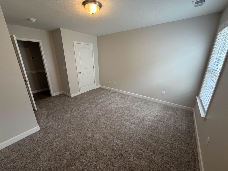 Spacious, unfurnished interior of a new home in Stones Throw, Inman (Image 13).