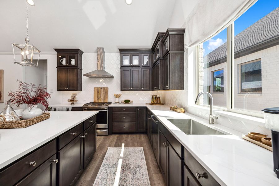 Kitchen with stainless steel appliances and glass upper cabinets Kitchen with stainless steel appliances and glass upper cabinets