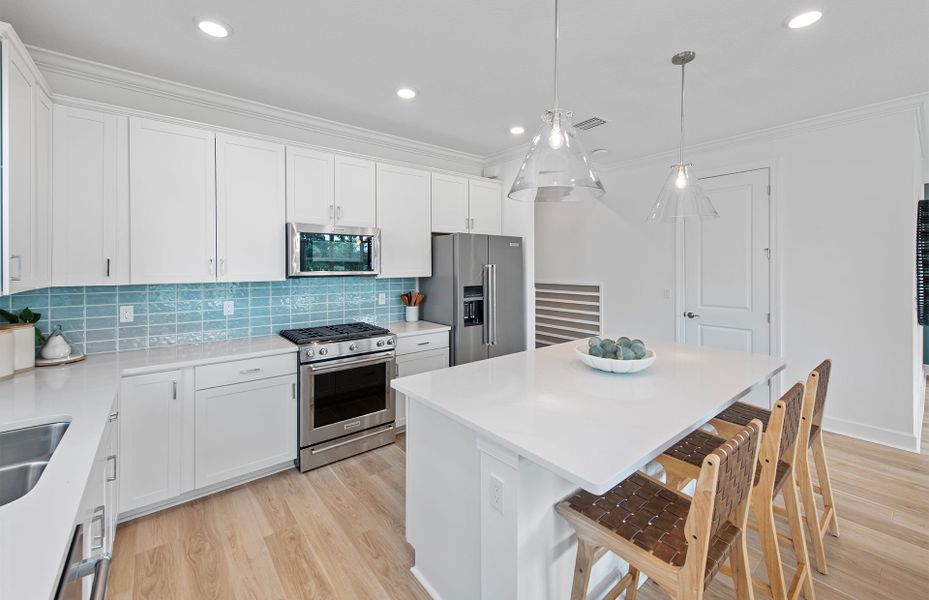Representative furnished interior of a home built from the Highgate by DiVosta in Harbor Isle, Vero Beach (Image 9).