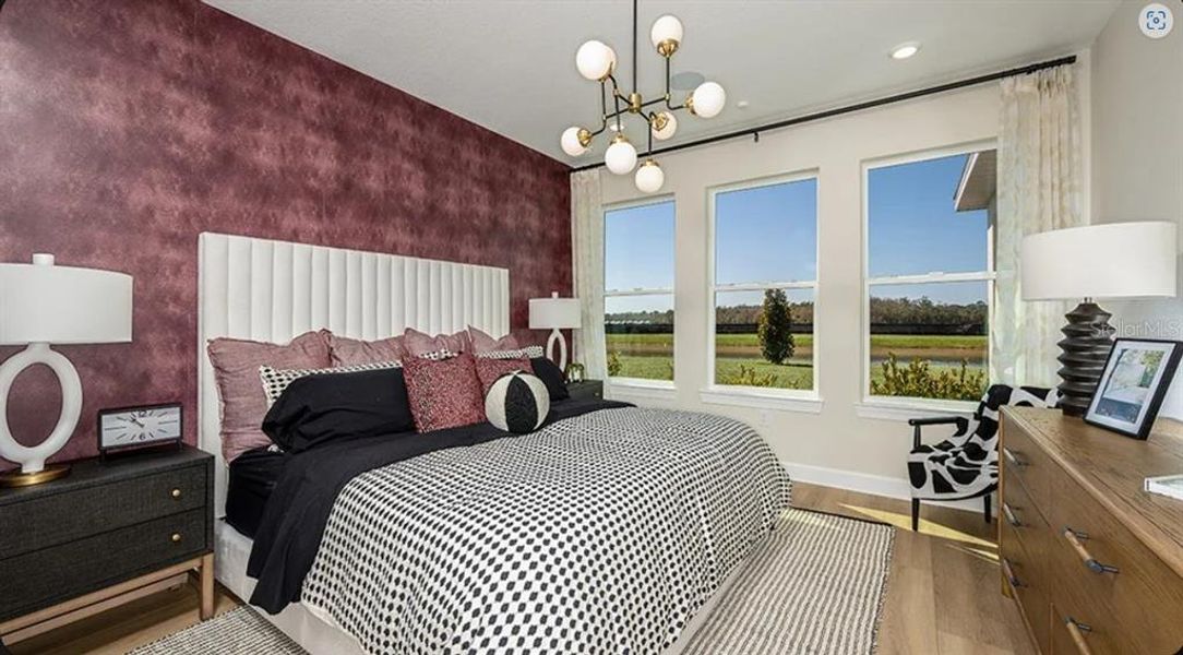 Furnished interior view inside a new home in Esplanade at Wellen Park, Englewood (Image 11).