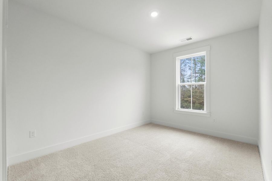 Spacious, unfurnished interior of a new home in Long Bay Golf Club, Longs (Image 36).