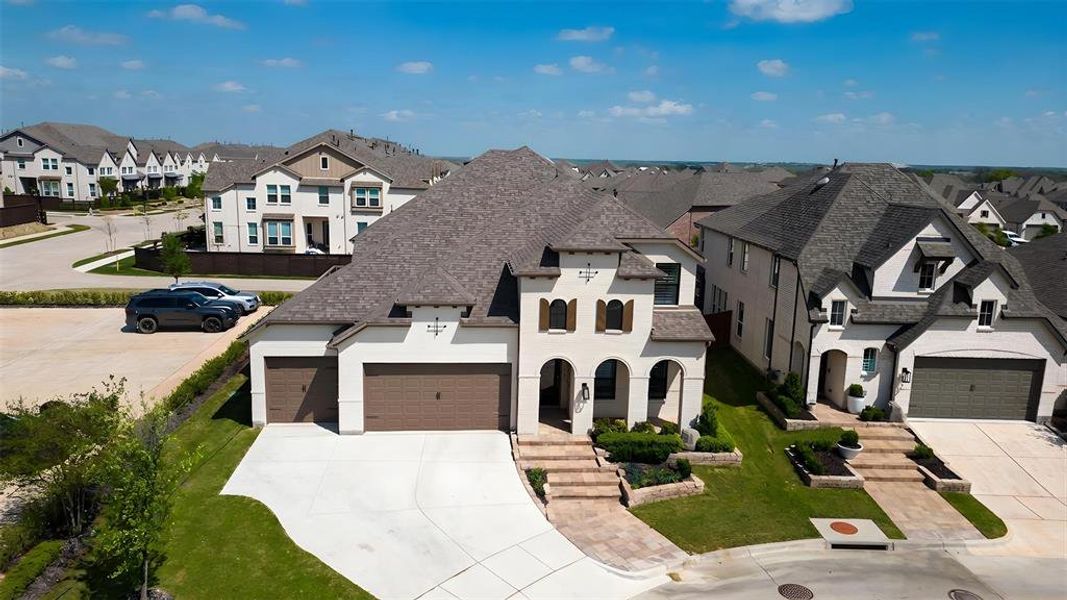 Front exterior of a new home in Bel Air Village, Sherman, TX, highlighting curb appeal (Image 23).