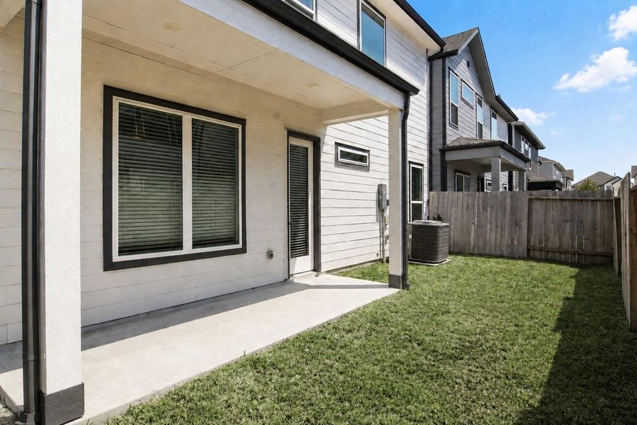 Exterior details and patio area of a home in , Houston (Image 3).