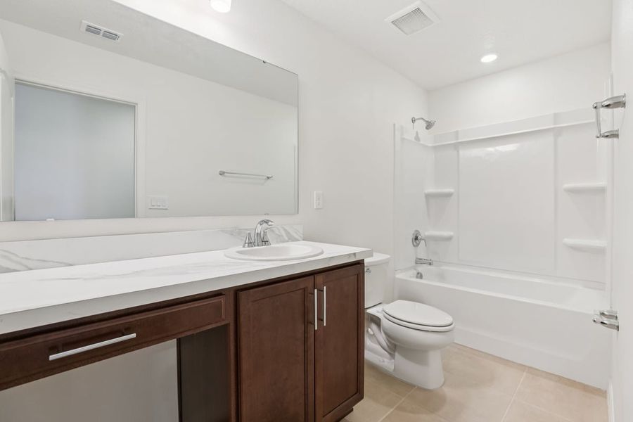 Furnished interior view inside a new home in Robins Run, Lake Wales (Image 13).