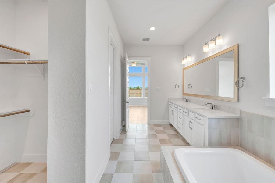 Furnished interior view inside a new home in Elyson - Reserve Collection, Katy (Image 12).