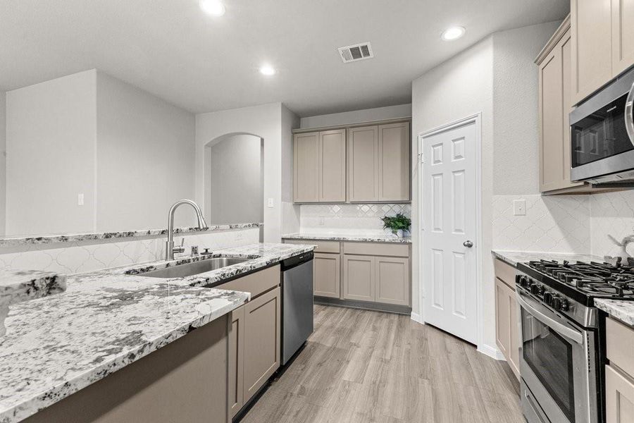 Furnished interior view inside a new home in Mill Creek Trails, Magnolia (Image 7).