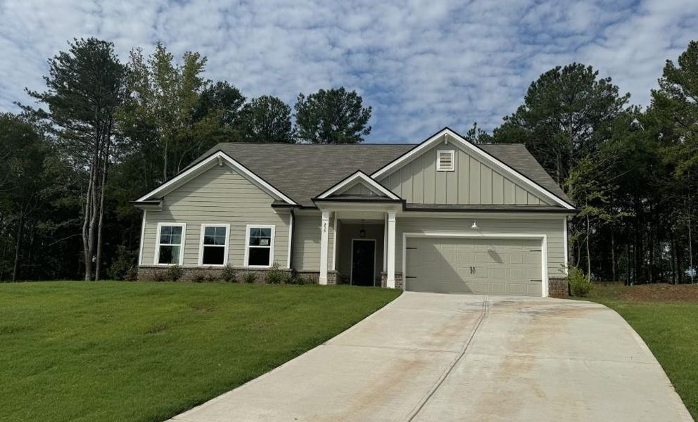 Front exterior of a new home in , Winder, GA, highlighting curb appeal (Image 1).