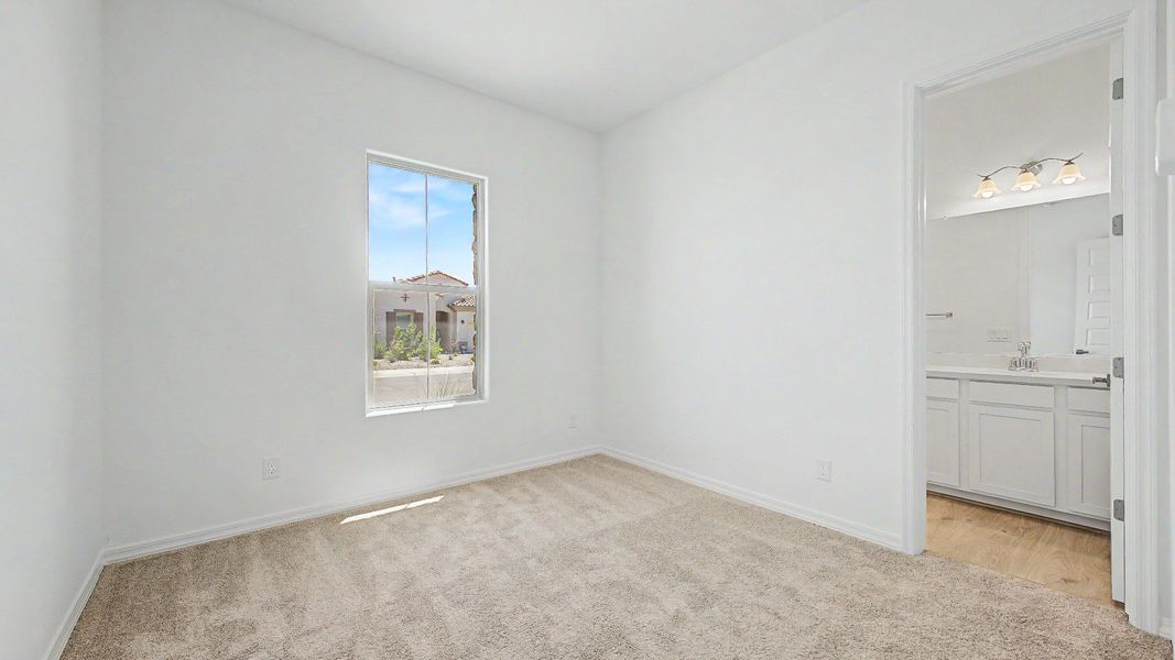 Furnished interior view inside a new home in Windrose, Waddell (Image 27).