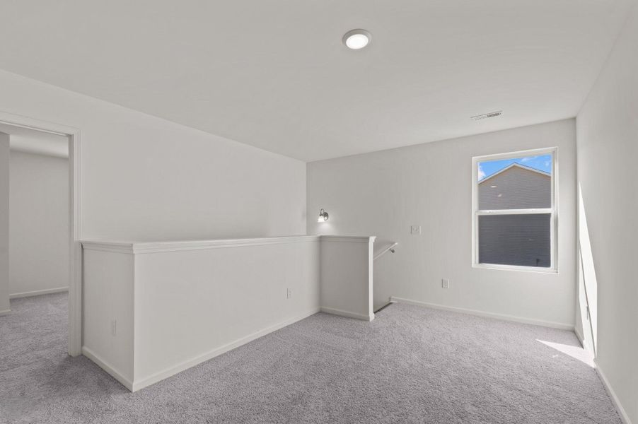 Representative unfurnished interior of a home built from the Solstice by Starlight Homes in Noble Ridge, Howe (Image 23).