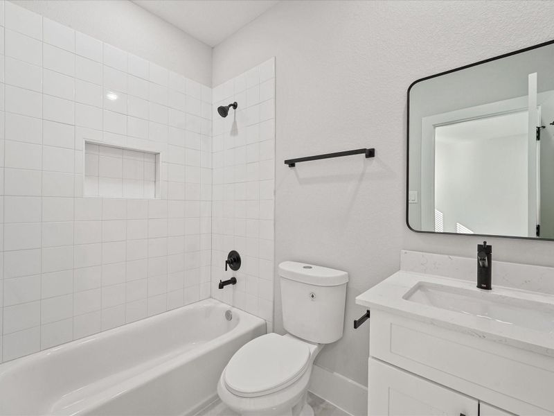 Furnished interior view inside a new home in Skyline Homes at Cavalcade, Houston (Image 17).