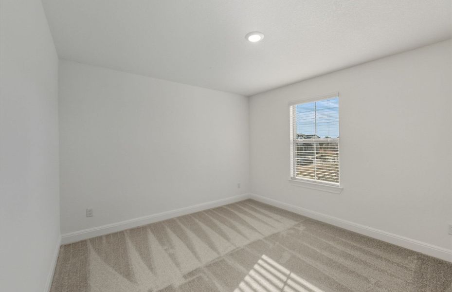 Spacious, unfurnished interior of a new home in Saddleback at Santa Rita Ranch, Liberty Hill (Image 19).