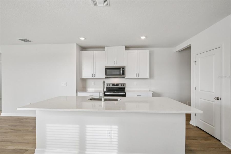 Furnished interior view inside a new home in Salt Meadows - Premier Series, Parrish (Image 7).