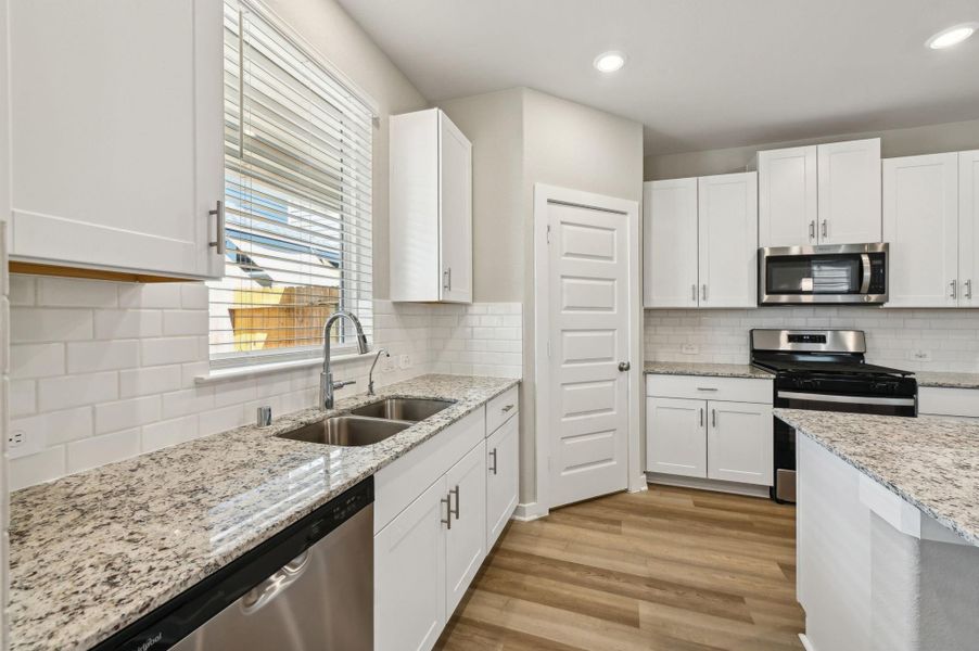 Photo is not of the actual home, but is an inspirational photo of builder’s model home and may depict options, furnishings, and/or decorator features that are not included