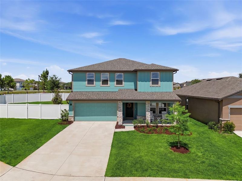 Front exterior of a new home in , Clermont, FL, highlighting curb appeal (Image 2). Front exterior of a new home in , Clermont, FL, highlighting curb appeal (Image 2).