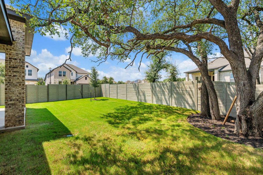 Exterior details and patio area of a home in Wolf Ranch, Georgetown (Image 28).
