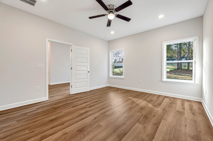 Spacious, unfurnished interior of a new home in Southern Charm, Crestview (Image 26).
