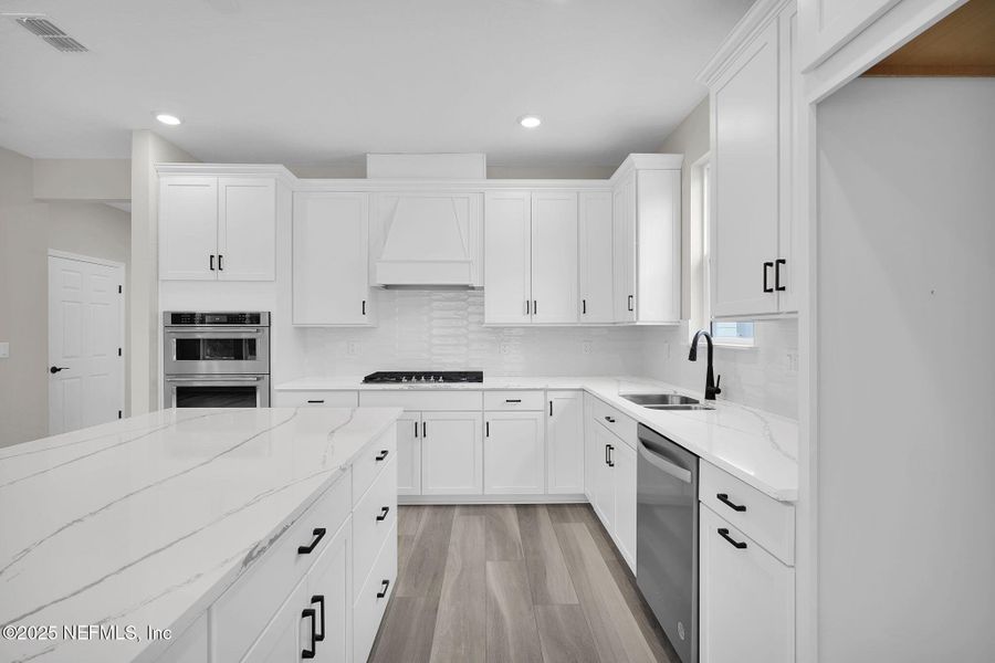 Furnished interior view inside a new home in Del Webb Wildlight, Yulee (Image 12).