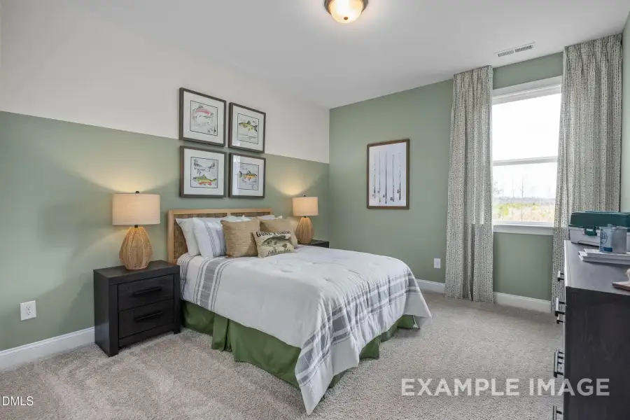 Furnished interior view inside a new home in Addison West, Holly Springs (Image 19).