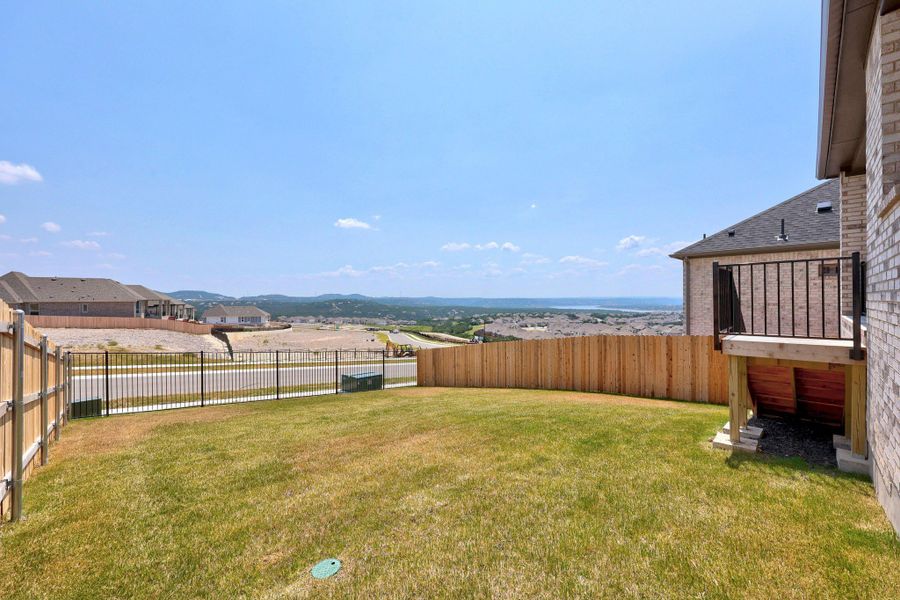 Exterior details and patio area of a home in Lakeside at Tessera, Lago Vista (Image 24).