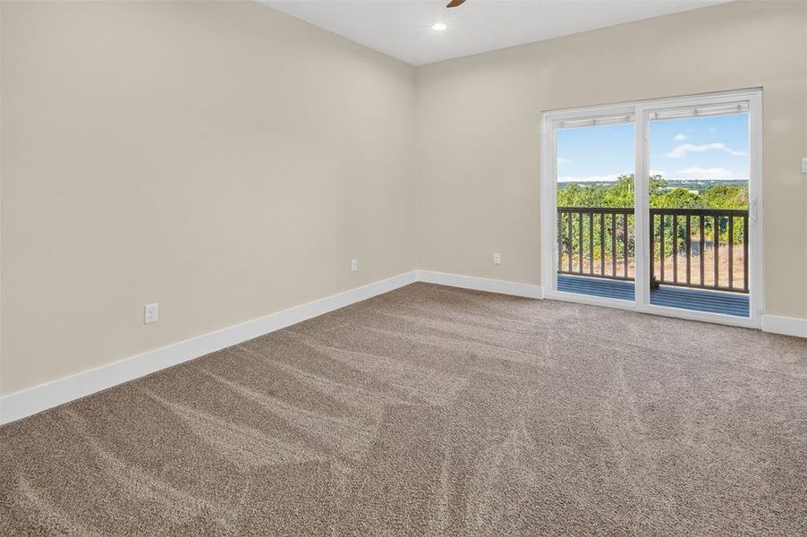 primary bedroom with balcony, what a view!