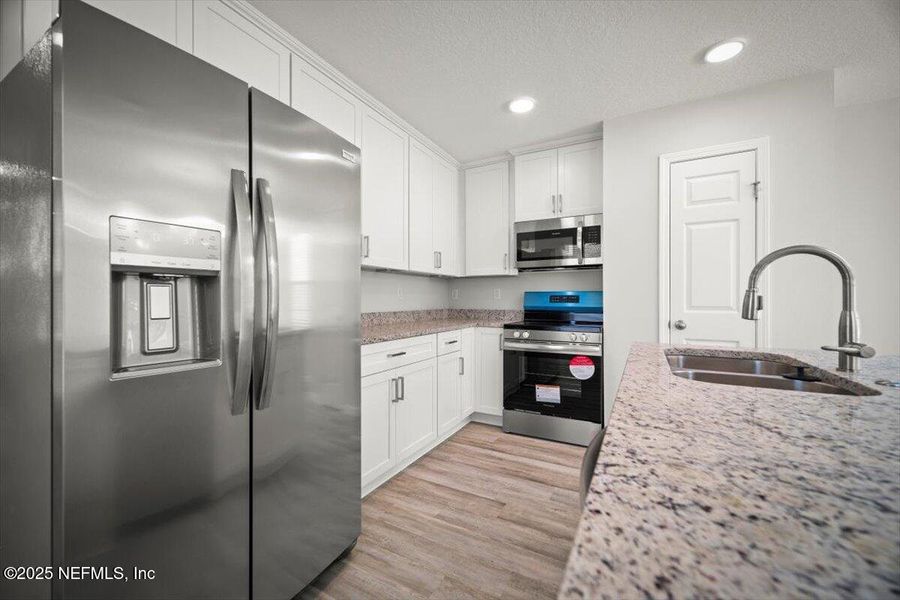 Furnished interior view inside a new home in , Jacksonville (Image 4). Furnished interior view inside a new home in , Jacksonville (Image 4).