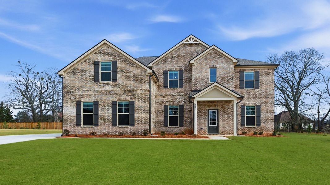 Representative exterior photo of a completed home built from the Meridian II by DRB Homes in Cambria at Traditions, Hampton, GA (Image 21). Representative exterior photo of a completed home built from the Meridian II by DRB Homes in Cambria at Traditions, Hampton, GA (Image 21).