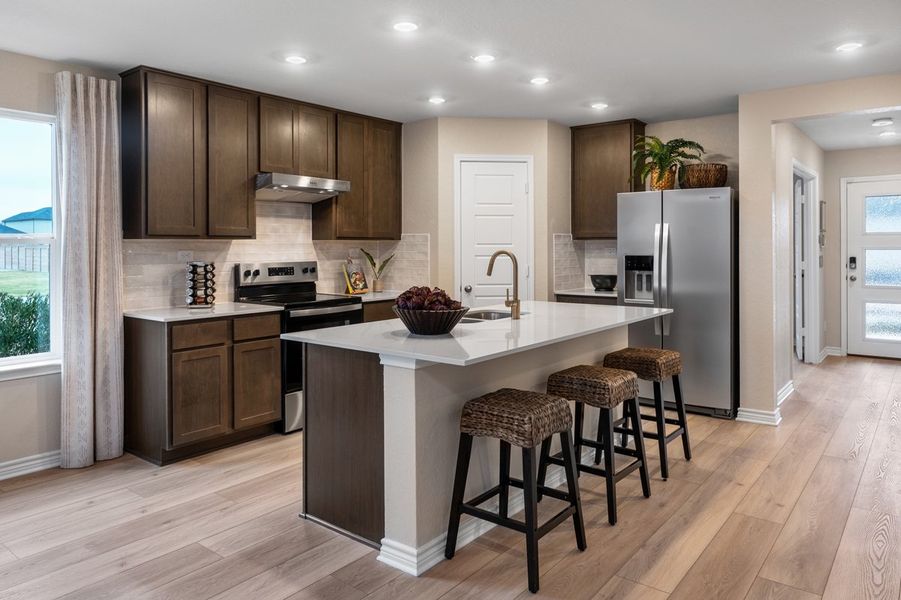 Representative furnished interior of a home built from the 2701 by KB Home in Preserve at Culebra - Sterling Collection, San Antonio (Image 6).