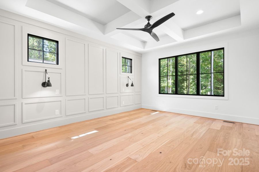 Primary suite downstairs with lots of windows